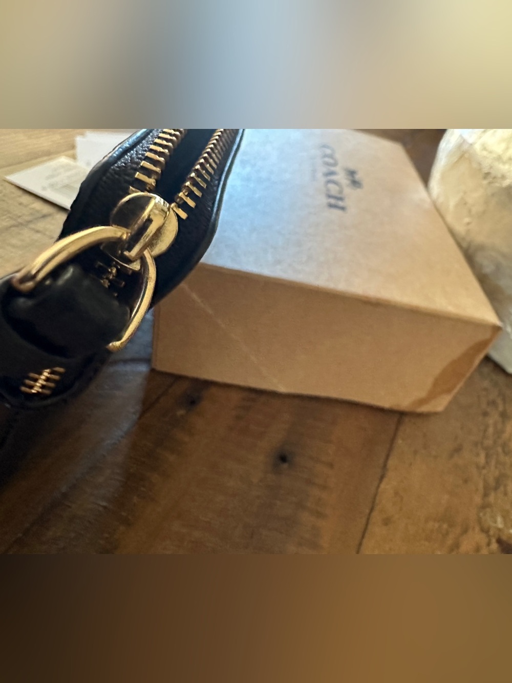 Black Coach Corner Zip Wristlet in Signature Black Debossed Patent Leather. - Picture 3 of 5